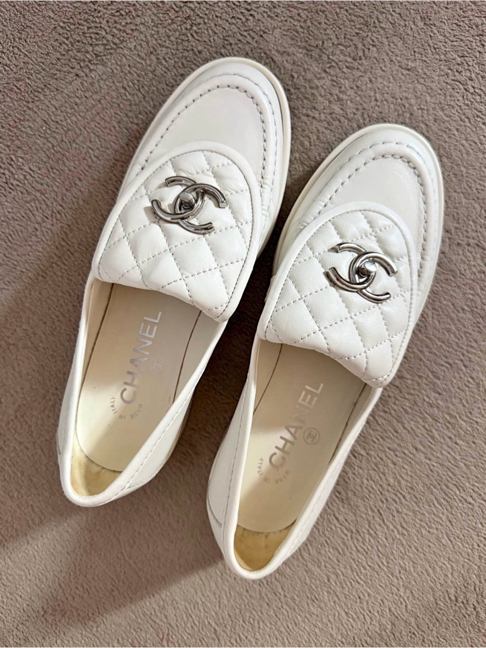CHANEL White Quilted Leather Loafers with Silver CC Emblem